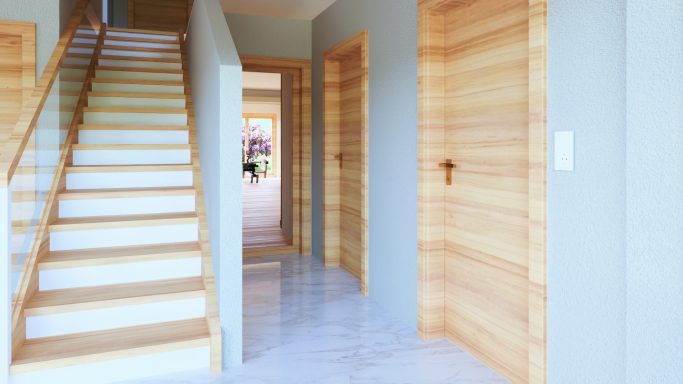 Holztreppe und Flur mit Türen in einem modern gestalteten Innenraum.