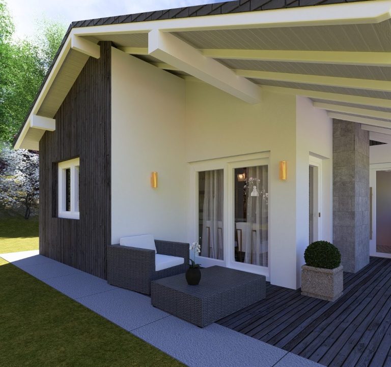 Bau eines modernen Hauses mit Gerüst und Kränen im Hintergrund.