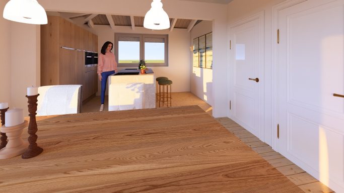 Moderne Küche mit Holzdetails, eine Person steht am Arbeitsplatz, Blick nach draußen.