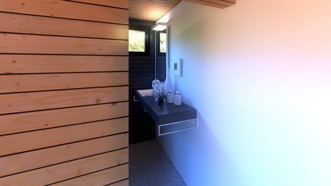 Blick auf ein modernes Badezimmer mit Holzverkleidung und Waschbecken.