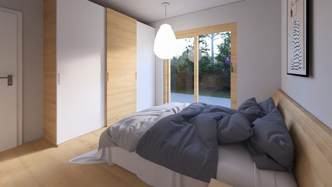 Helles Schlafzimmer mit einem Bett, einer Lampe und Fensterblick nach draußen.