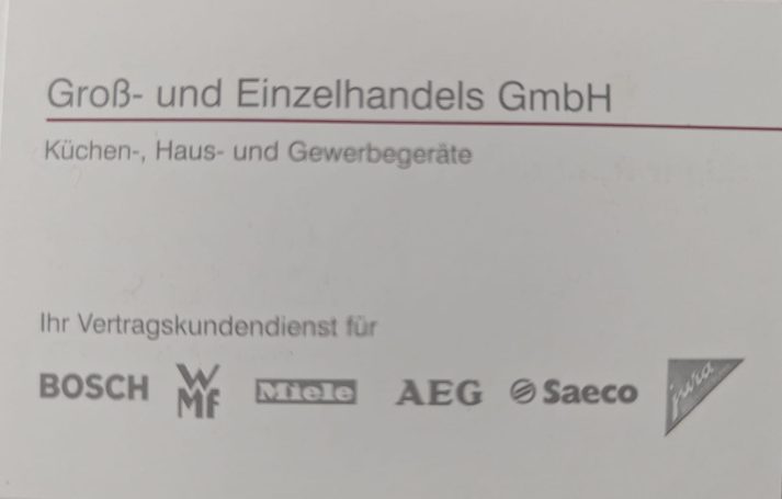 Logo und Name der Groß- und Einzelhandels GmbH für Küchen, Haus- und Gewerbegeräte.