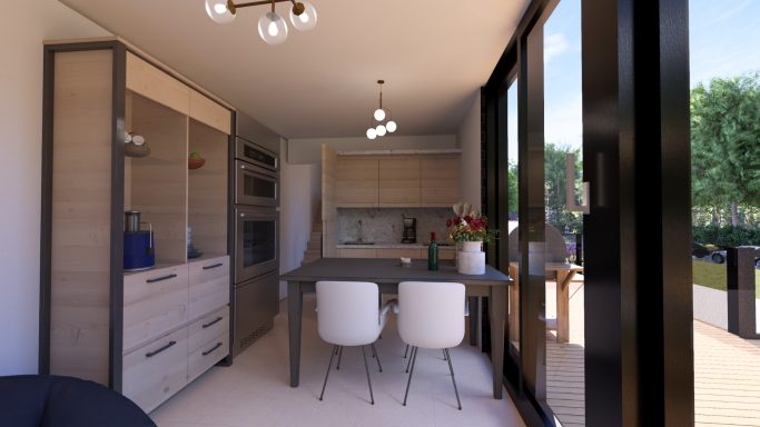 Moderne Küche mit Essbereich, großen Fenstern und Pflanzen im Innenhof.