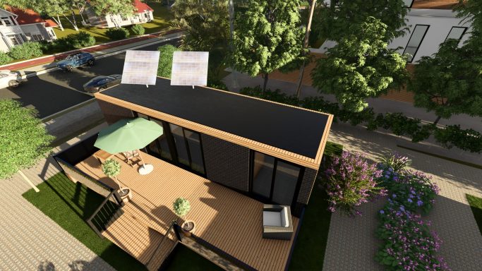Modernes Haus mit Solarpaneelen, Terrasse und umgeben von Grünanlagen.