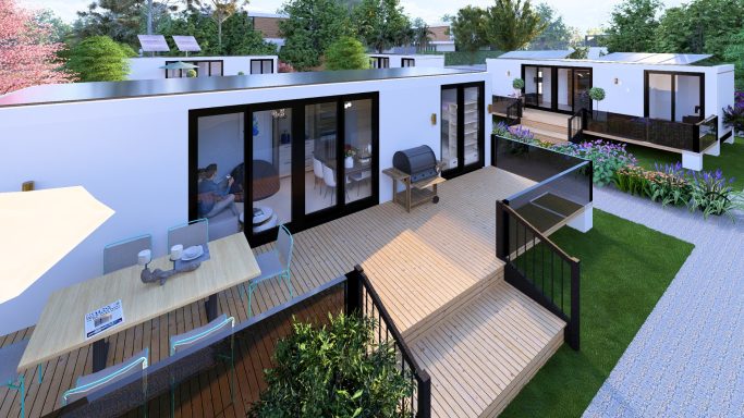 Moderne Wohnhäuser mit Terrassen und Grünaussicht, umgeben von Gartenanlagen.