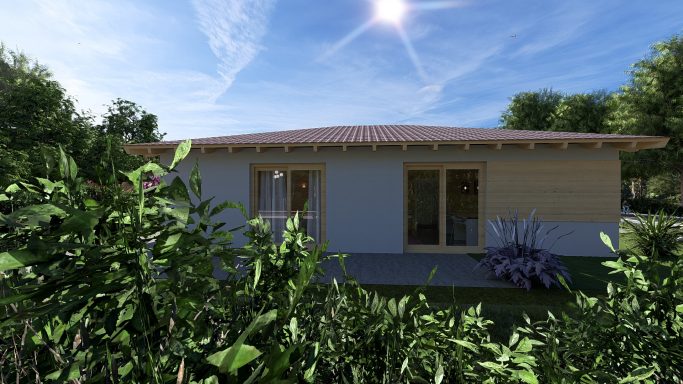 Modernes Einfamilienhaus mit großen Fenstern, umgeben von Pflanzen und Bäumen.