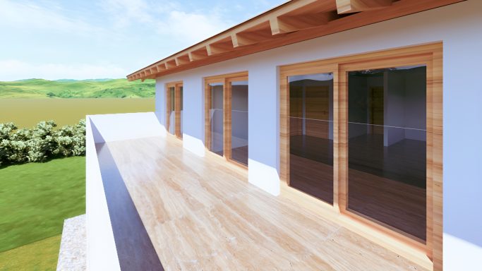 Moderne Terrasse mit Holzverkleidung und großen Fenstern, umgeben von grüner Landschaft.