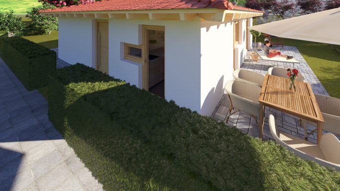 Kleines Haus mit Terrasse, Gartenmöbeln und angrenzendem Rasenbereich.