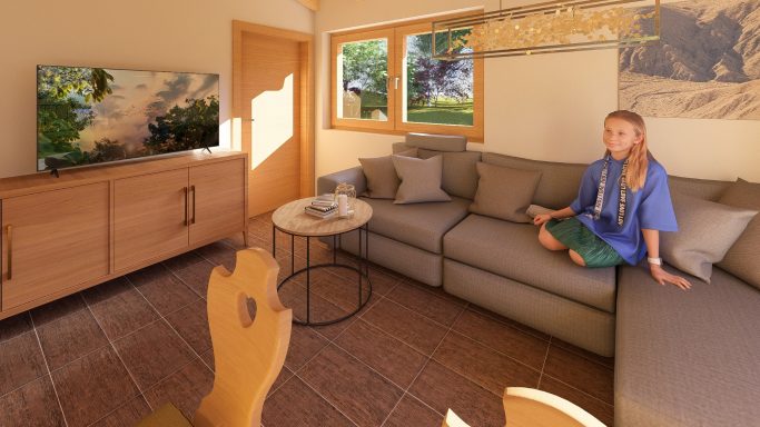 Heller Wohnbereich mit Sofa, Tisch und Fenster, ein Kind sitzt entspannt auf dem Sofa.